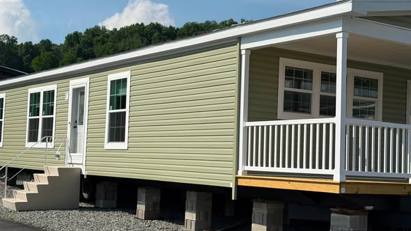 QUALITY PORCH MODEL WITH  8X28   PORCH , FLEXIBLE FLOOR PLAN…. TOTAL DRYWALL
